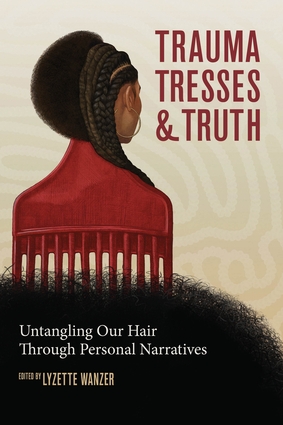 book cover showing an afro pick and black woman with half braided hair